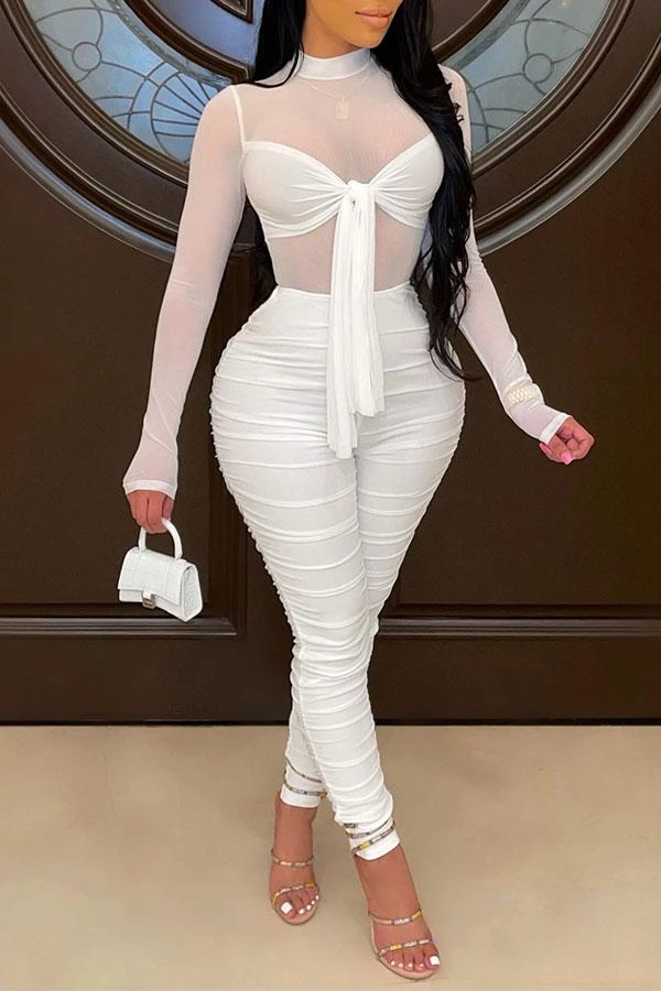 Solid Color On-trend Strappy See-Through Jumpsuit 1 Solid Color On-trend Strappy See-Through Jumpsuit